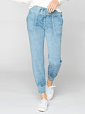 Phoebe Burnout Wash Sweatpants in washed denim blue with a tapered silhouette and knit texture