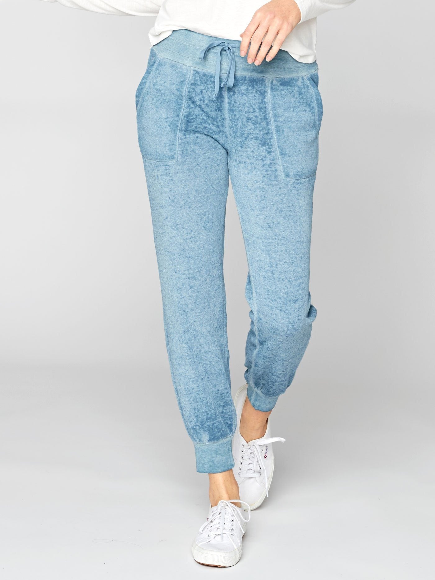 Phoebe Burnout Wash Sweatpants in washed denim blue with a tapered silhouette and knit texture