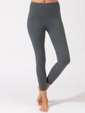 Charcoal grey ankle length leggings with high-rise waistband and side pockets.