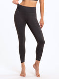 A pair of charcoal grey high-rise ankle length leggings in a fitted knit fabric.