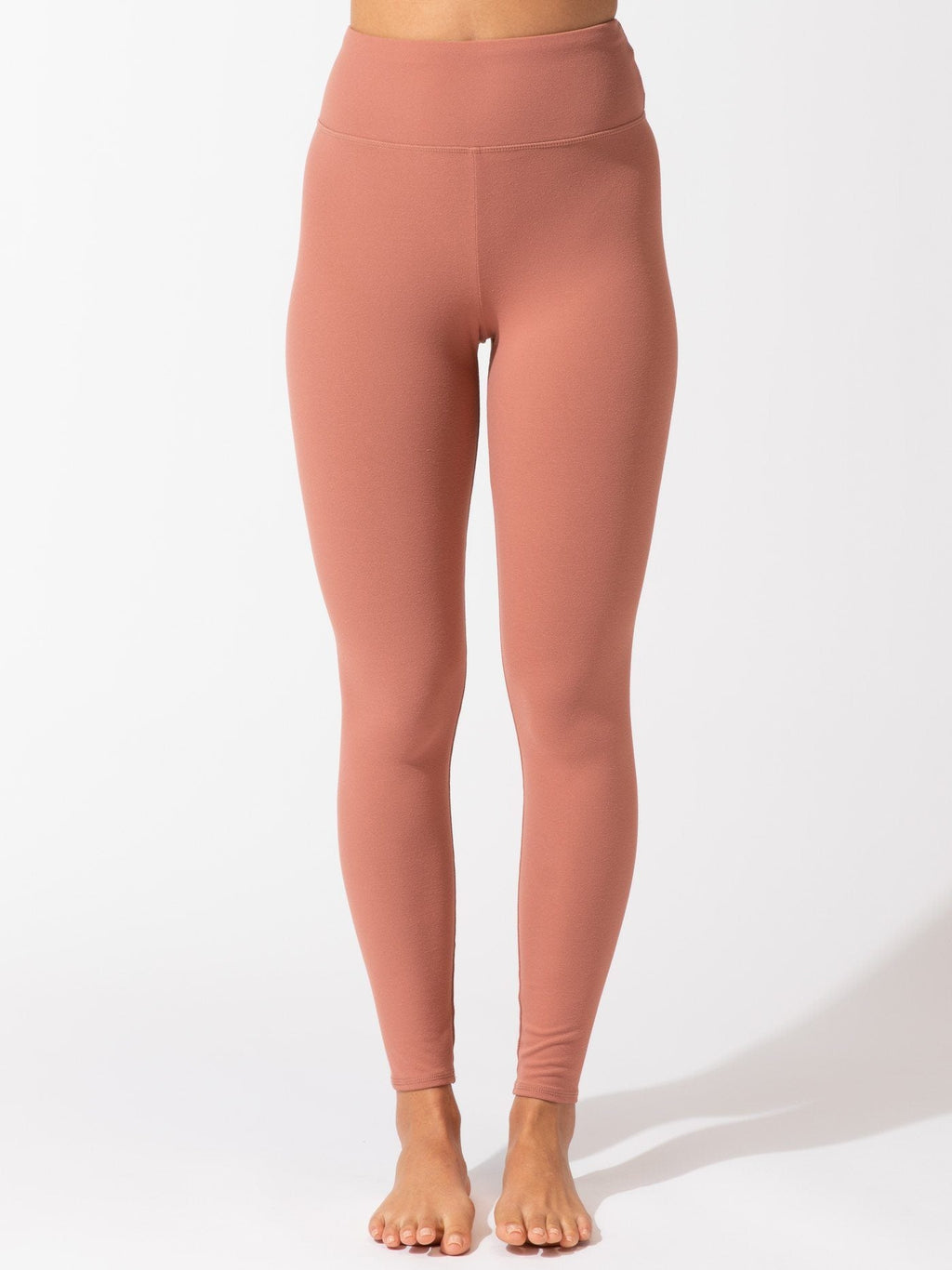 Dusty-rose full length leggings with high-rise waistband.