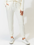 Solid cream Core Feather Fleece Jogger with a streamlined minimalist fit