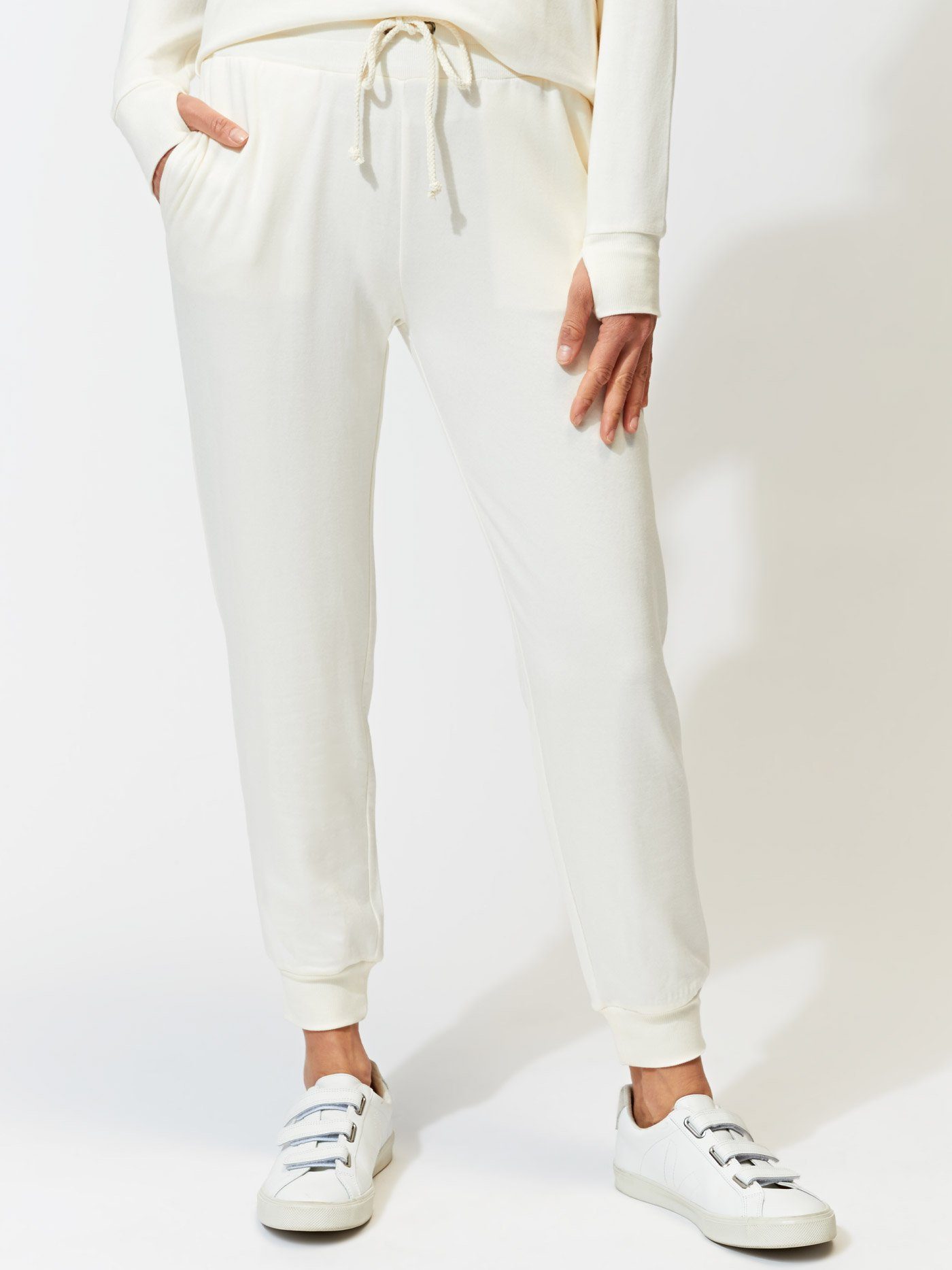 Solid cream Core Feather Fleece Jogger with a streamlined minimalist fit