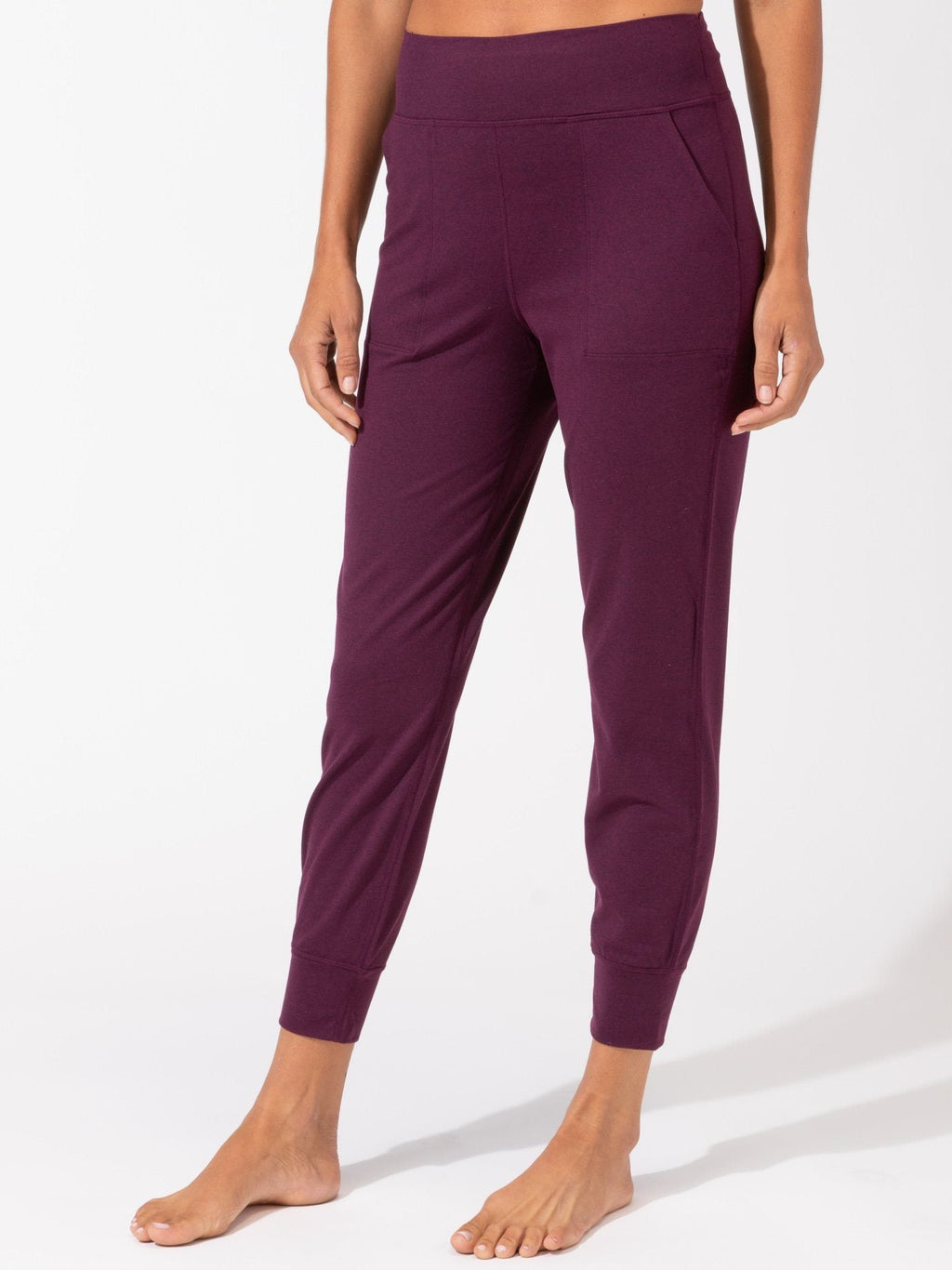 Lydia women's solid burgundy peached performance jersey jogger with side pockets.