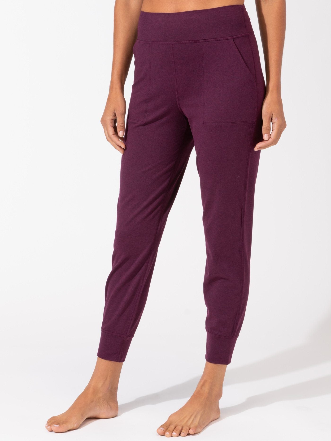 Lydia women's solid burgundy peached performance jersey jogger with side pockets.