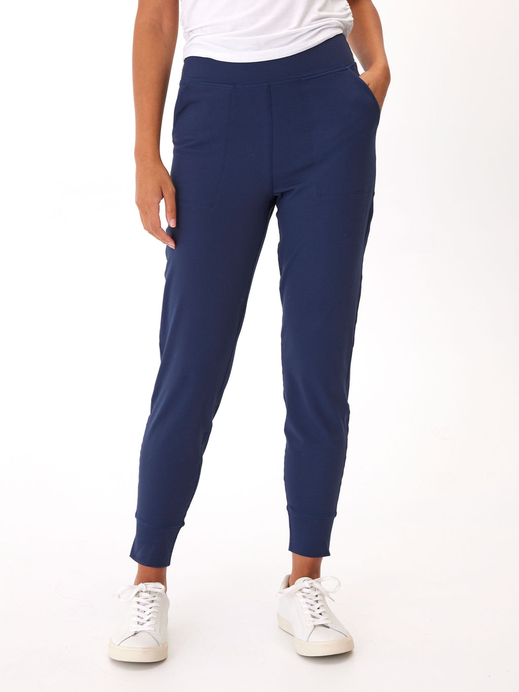 Side profile of the Lydia Jogger in Peached Performance Jersey featuring side pockets