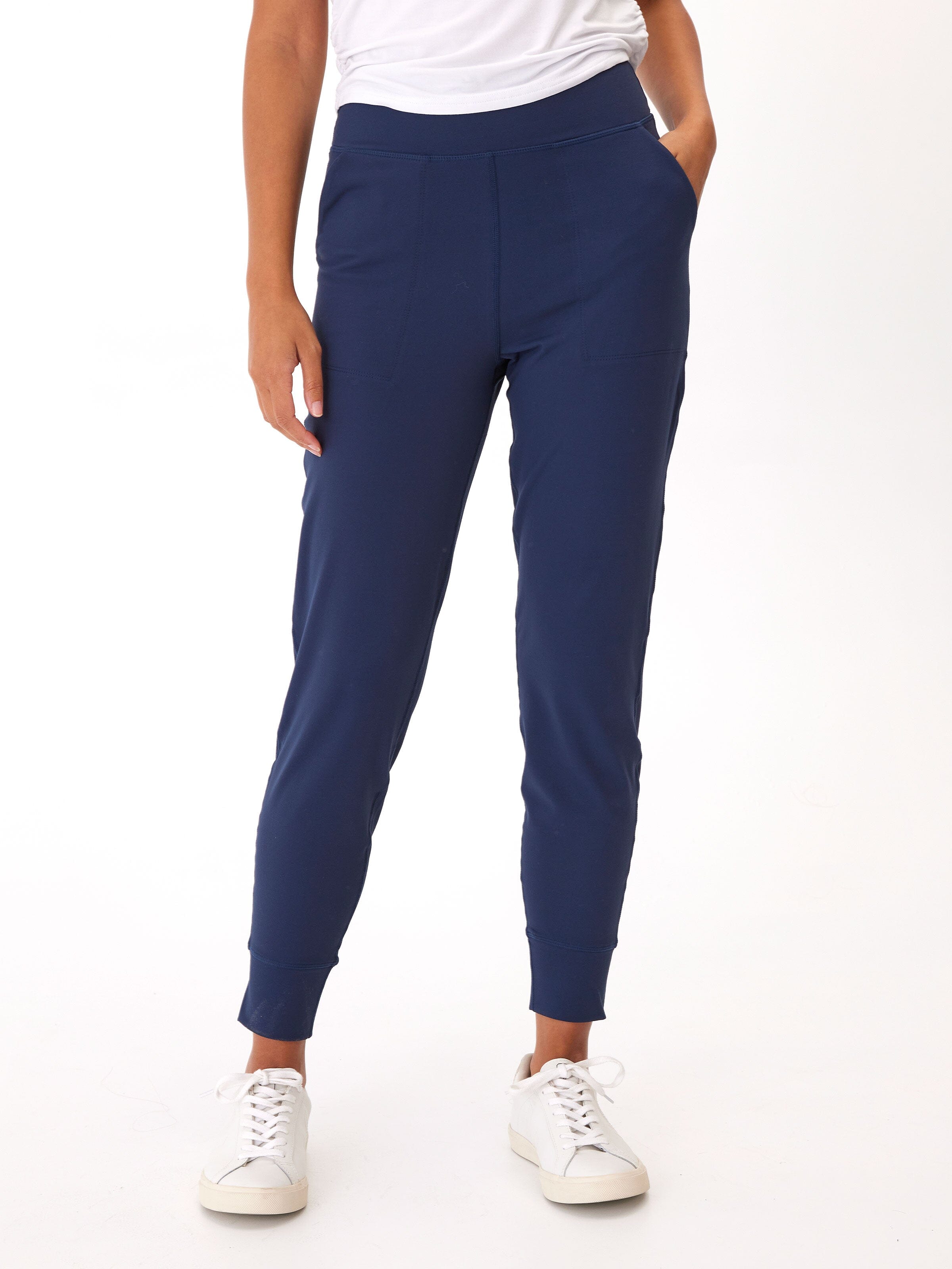 Side profile of the Lydia Jogger in Peached Performance Jersey featuring side pockets