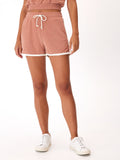 Tephanie dusty-rose and white colorblock terry cloth shorts with drawstring waistband.