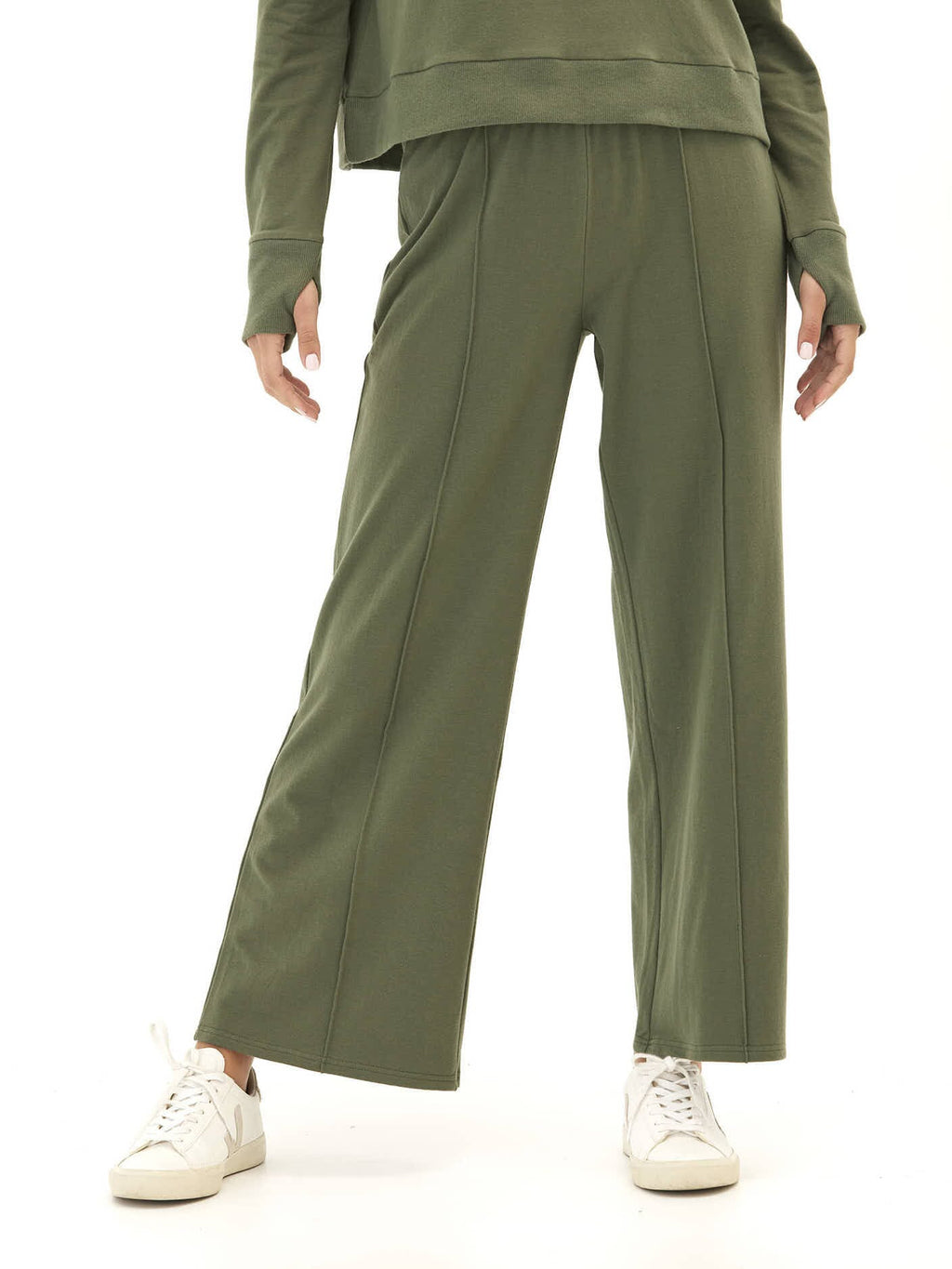 Model wearing Shiloh Cozy Fleece Rib Mix Wide Leg Pants in a soft, wide-leg silhouette with an elastic waistband.