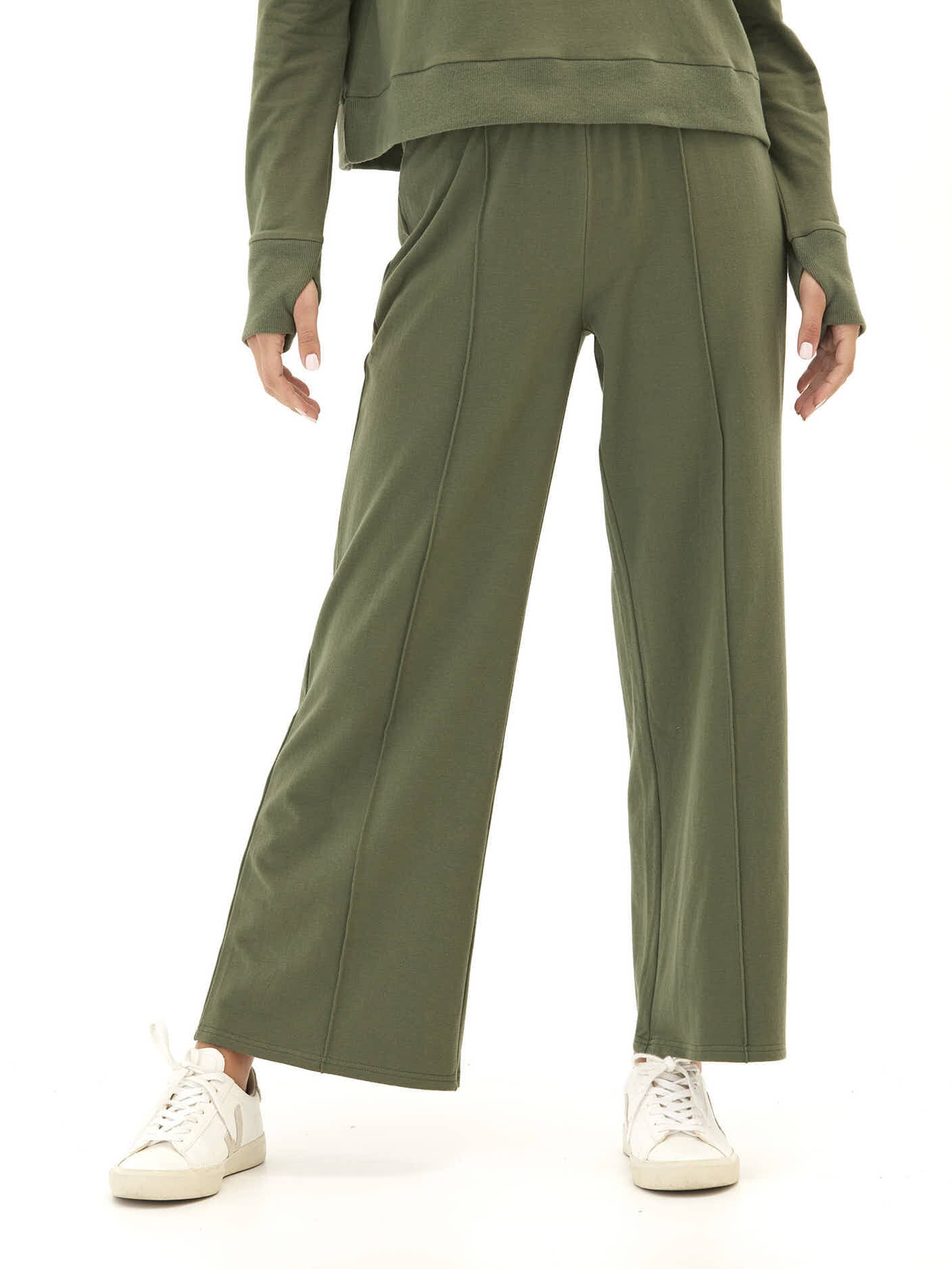 Model wearing Shiloh Cozy Fleece Rib Mix Wide Leg Pants in a soft, wide-leg silhouette with an elastic waistband.