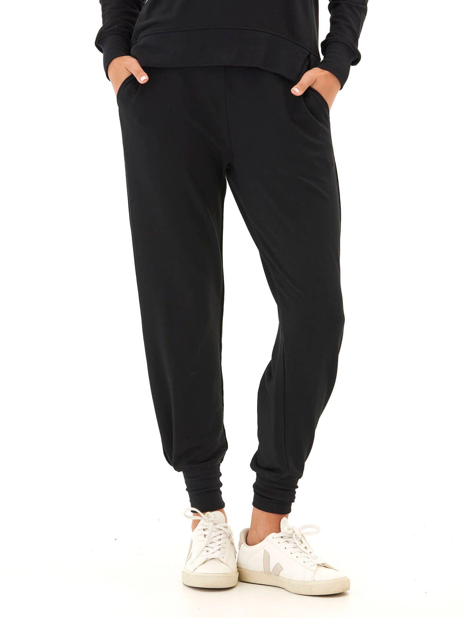 Close-up of the Zarina Modal Terry Tulip-Hem Jogger featuring soft fabric and a feminine tulip-hem detail