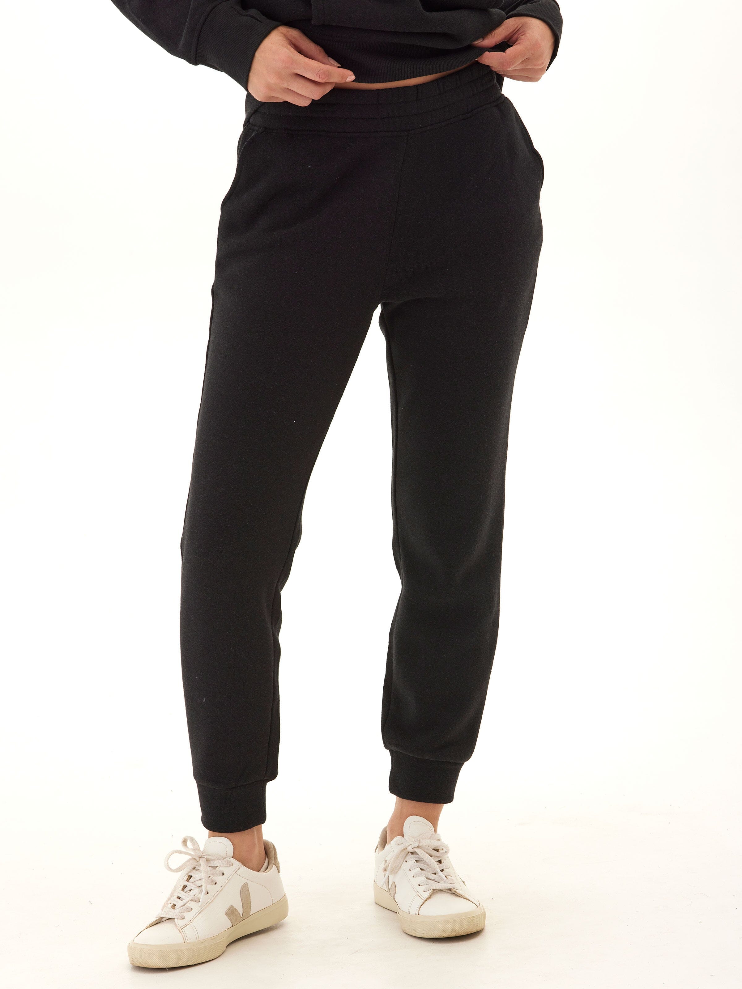 A pair of black Rowena Triblend Fleece Joggers in a relaxed, tapered fit with a mid-rise waistband.