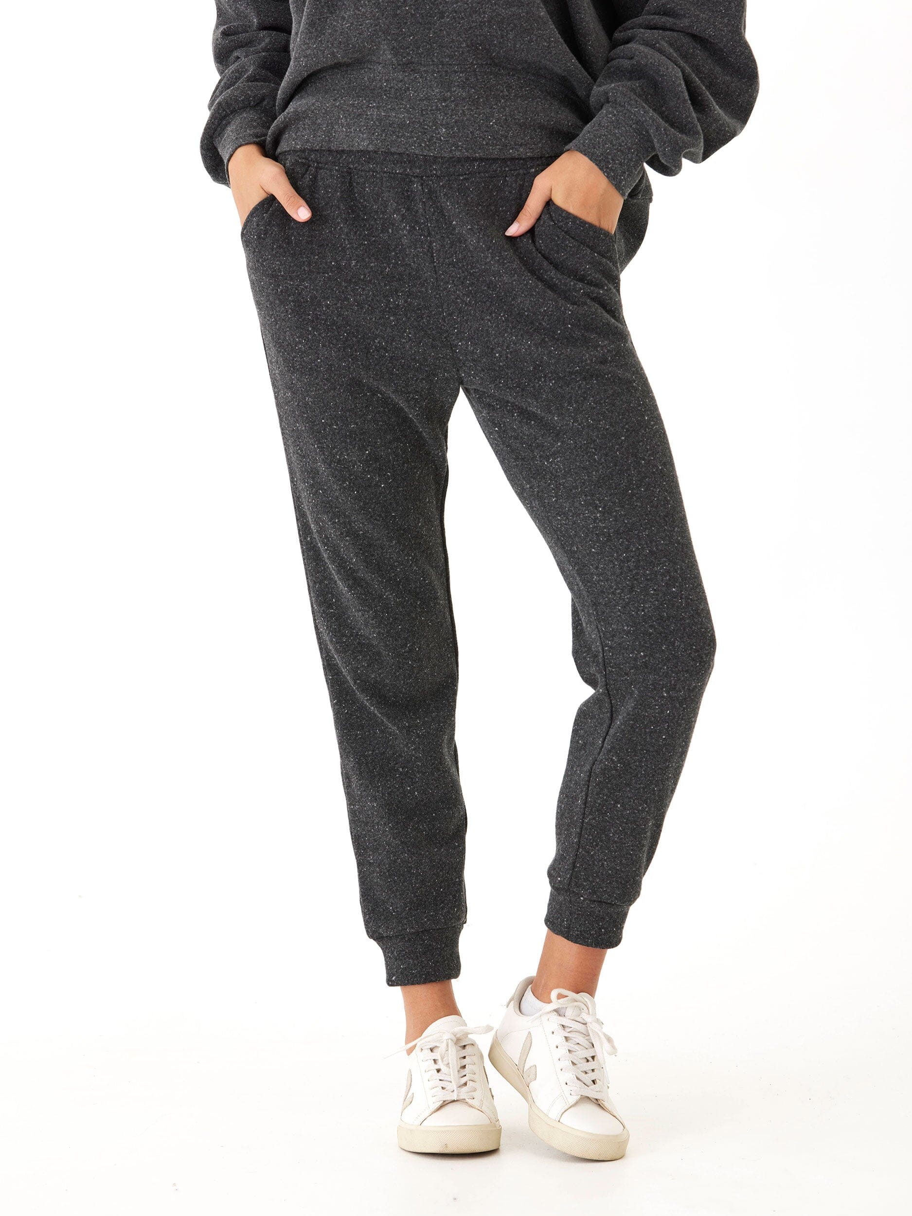 Women's relaxed fit triblend fleece joggers in charcoal heather with tapered ankle and elastic waistband