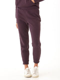 Women wearing deep plum Rowena Triblend Fleece Joggers with a tapered ankle and relaxed fit