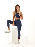 Katalina 7/8 high rise performance leggings in navy blue with mesh panels and side pockets
