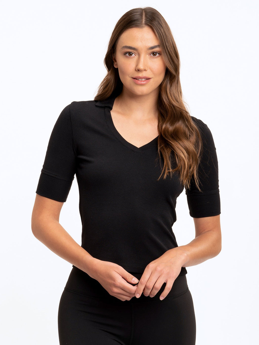 Black Aubrey collared rib v-neck knit top on a minimalist background