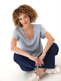 Close up of a light blue women's V-neck t-shirt in soft triblend jersey fabric