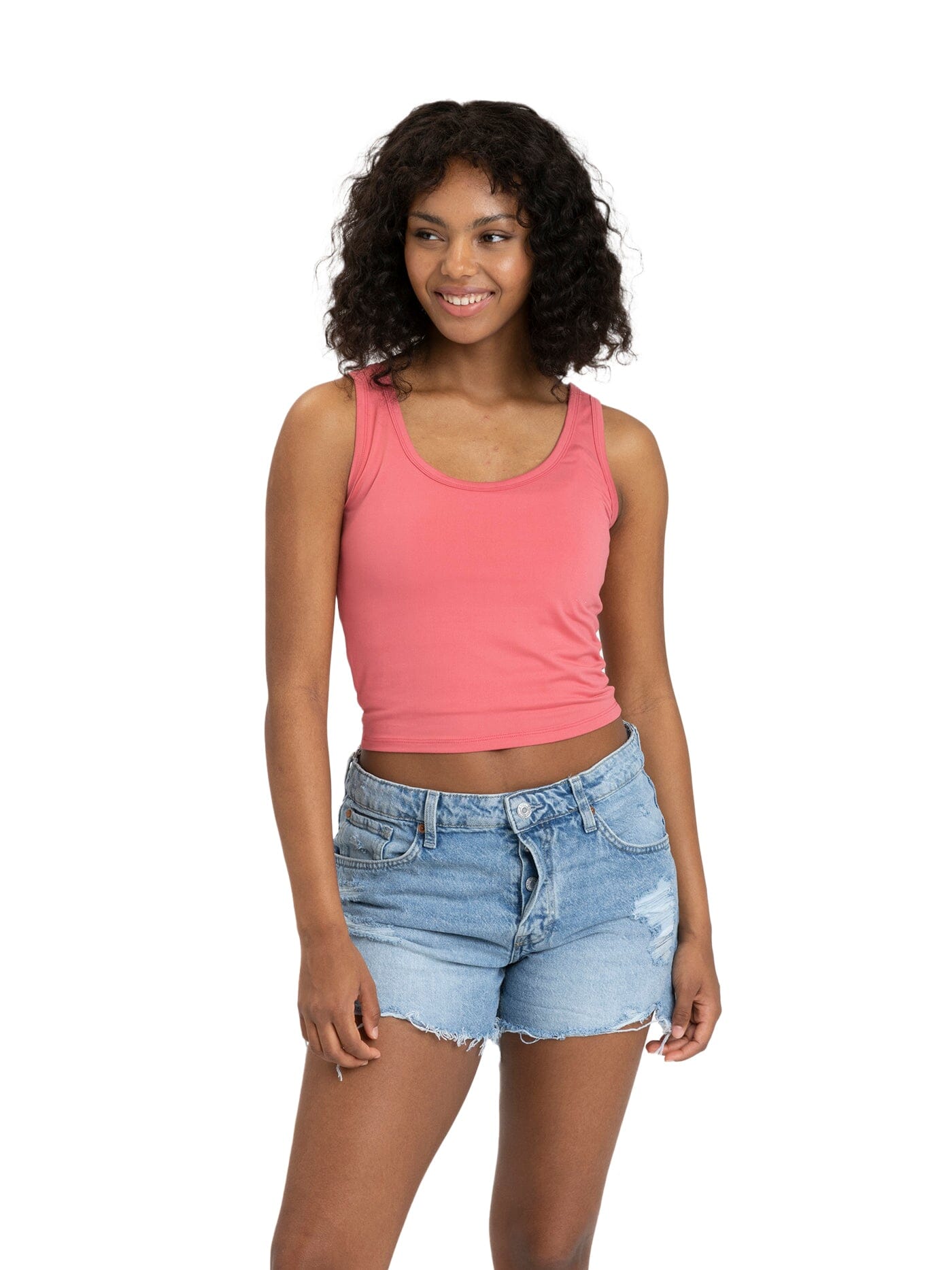Model wearing a fitted Core Luxe Jersey Tank Top in a cropped silhouette