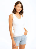 Woman wearing Amazonia Feather Rib Tank in white featuring a scoop neck and slim fit.