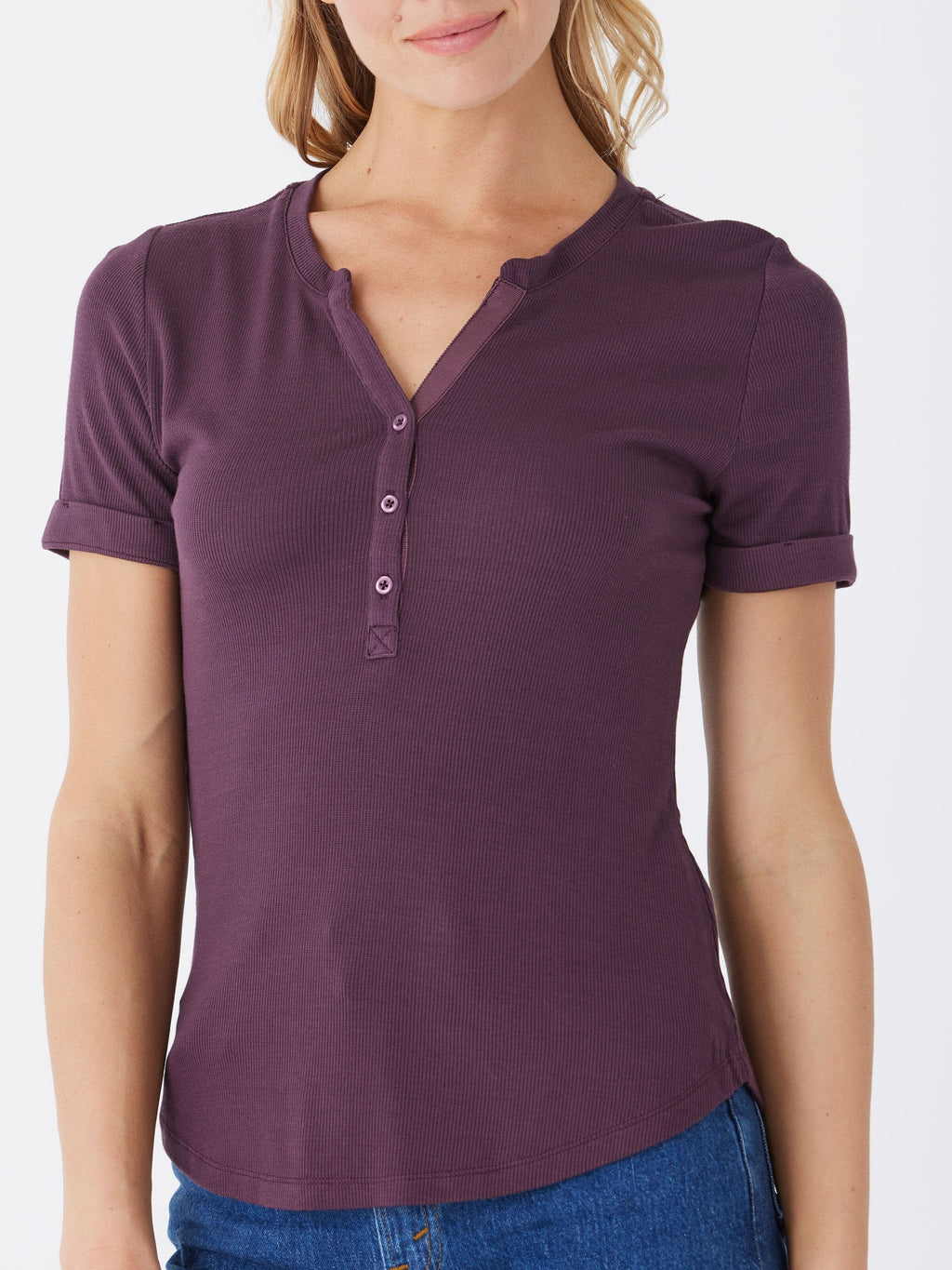 Akia Feather Rib Henley Tee showing ribbed texture and 3-button detail