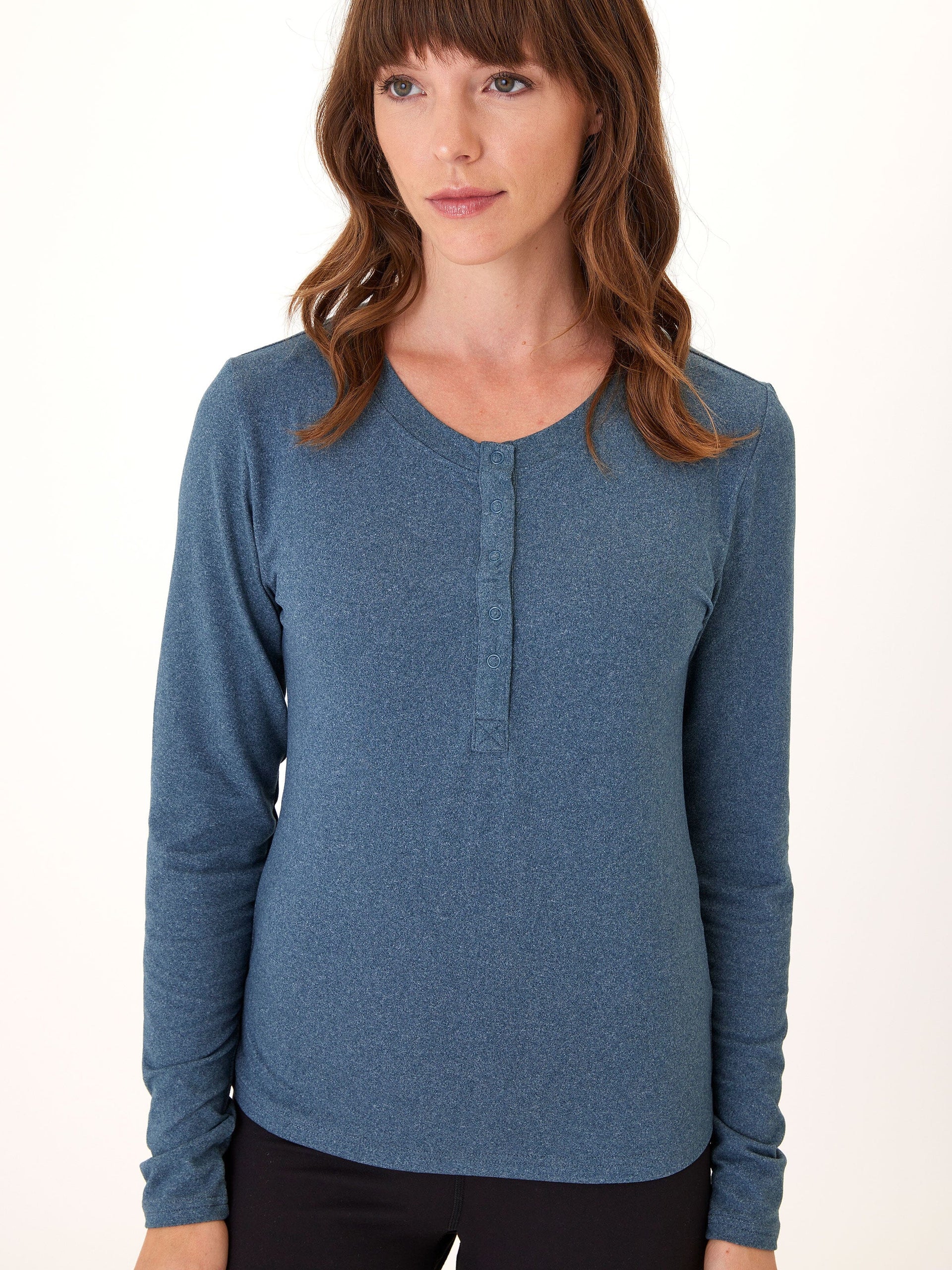 Lyla Luxe Jersey Henley Tee in a soft, eco-friendly fabric with a flattering meet and greet length hem.