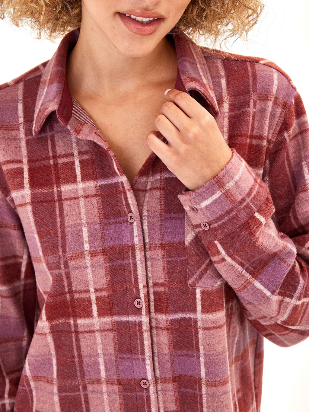 Close up of the Kandyce Knit Fleece Button Front Shirt featuring a unique dye print and button-up closure.