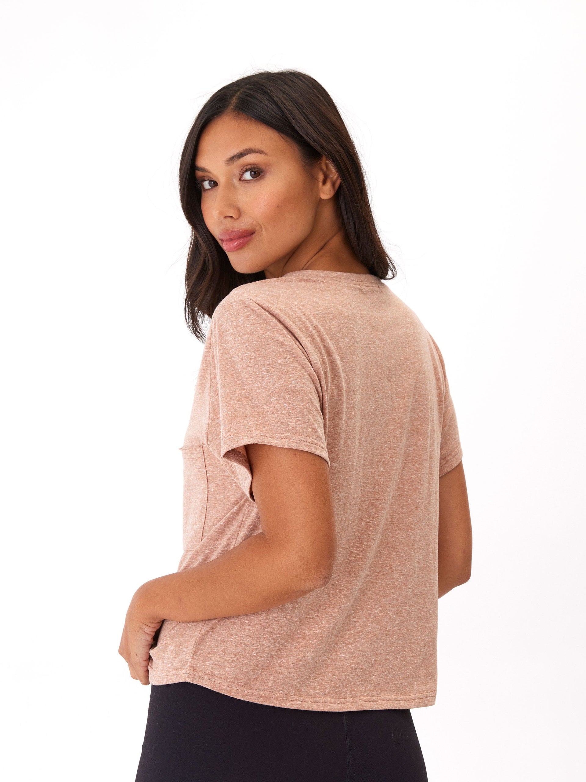 Model wearing a comfortable relaxed fit Core Triblend Jersey Pocket Tee with a classic crew neck.