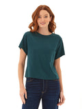 Woman wearing a dark-teal Core Triblend Jersey Pocket Tee with a classic crew neckline and chest pocket.