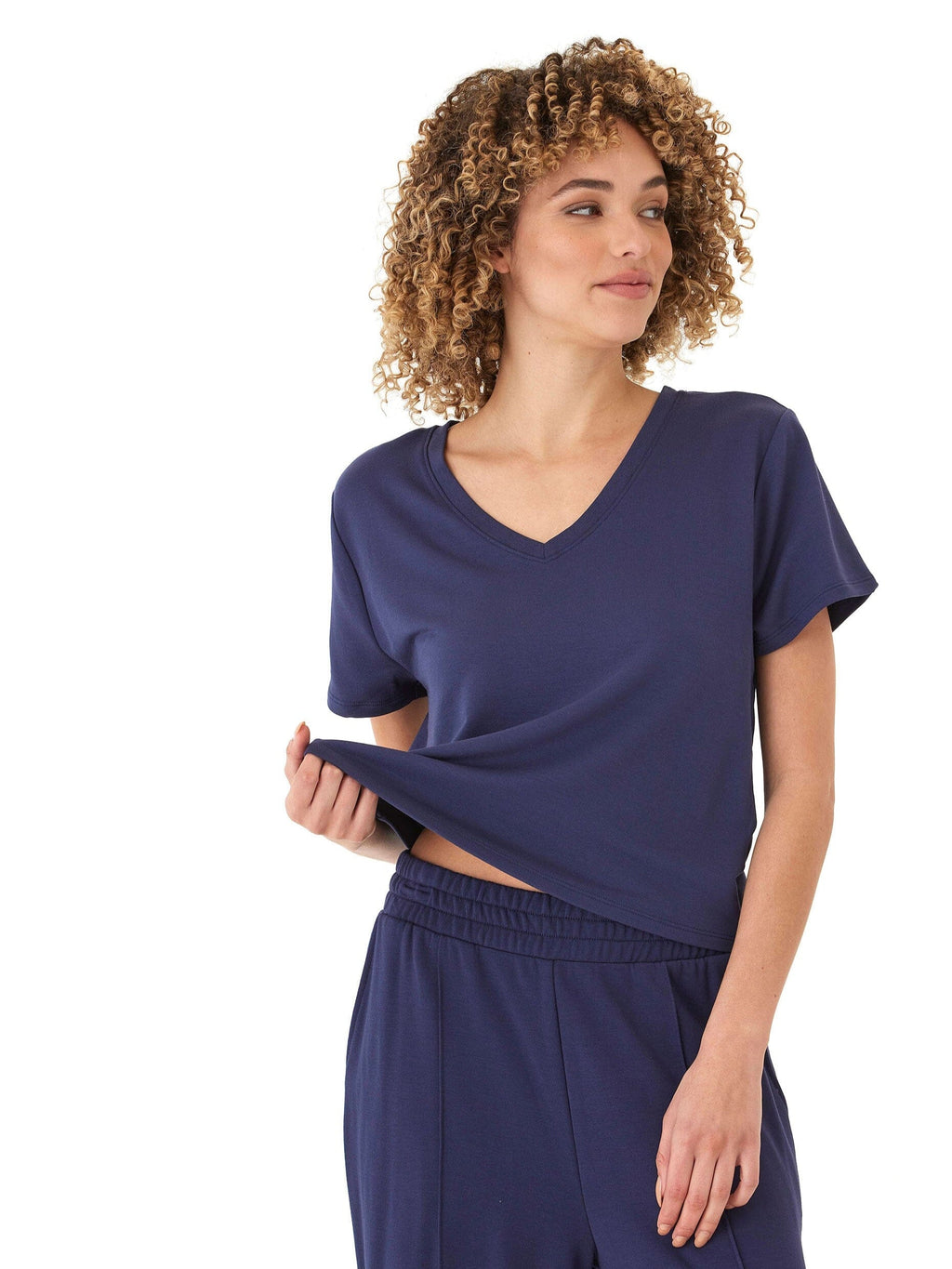 Model wearing a soft Core Modal Terry V-Neck Tee in a relaxed, flattering fit.