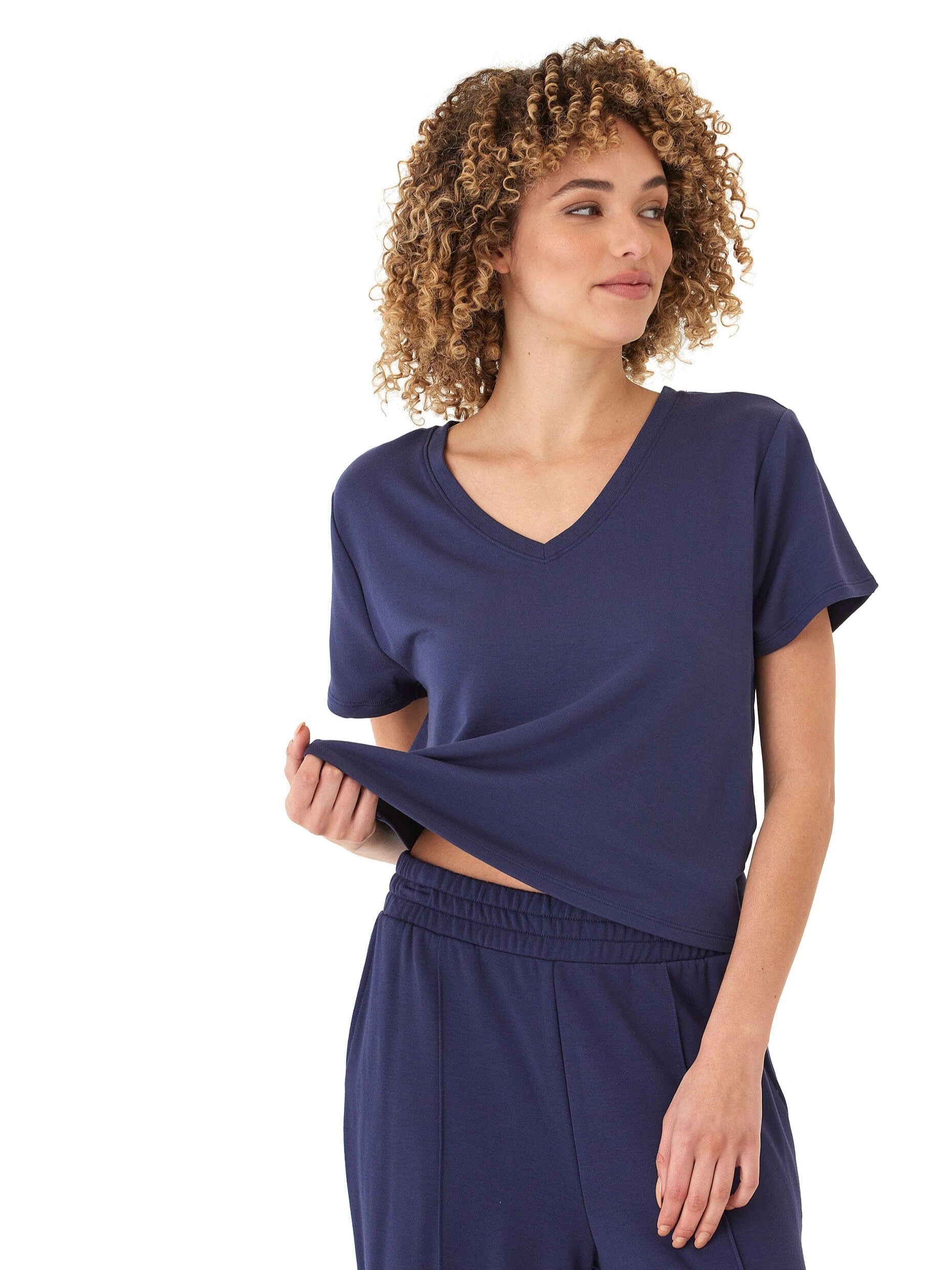 Model wearing a soft Core Modal Terry V-Neck Tee in a relaxed, flattering fit.