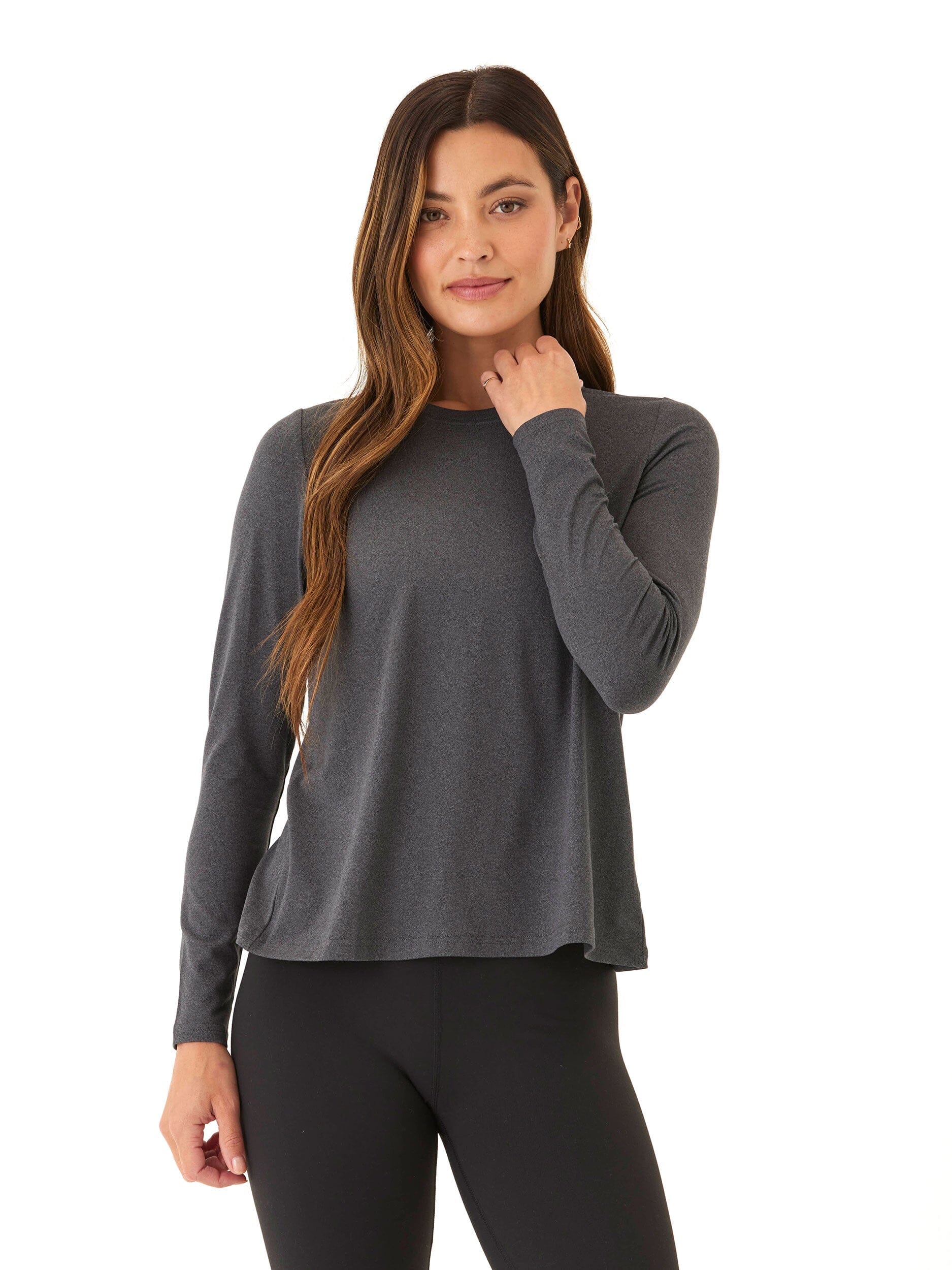 Model wearing the Gemella Luxe Jersey long sleeve top featuring a tulip-back design and relaxed fit.