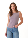 A woman wearing the minimalist Antonia Luxe Jersey sleeveless fitted top in dusty mauve