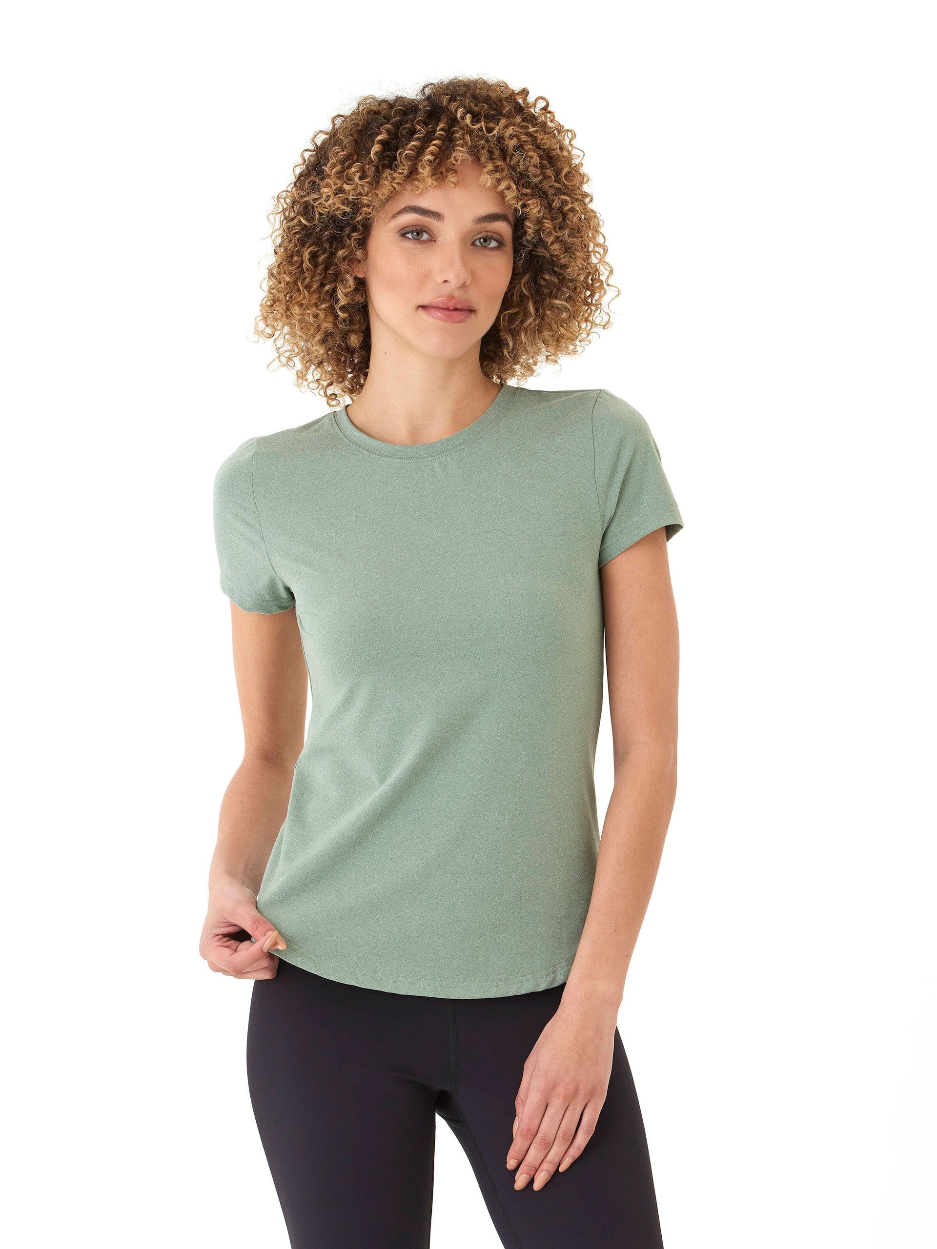 A woman wearing a soft jersey Arry Luxe tee with elegant back ruching detail in a relaxed fit.
