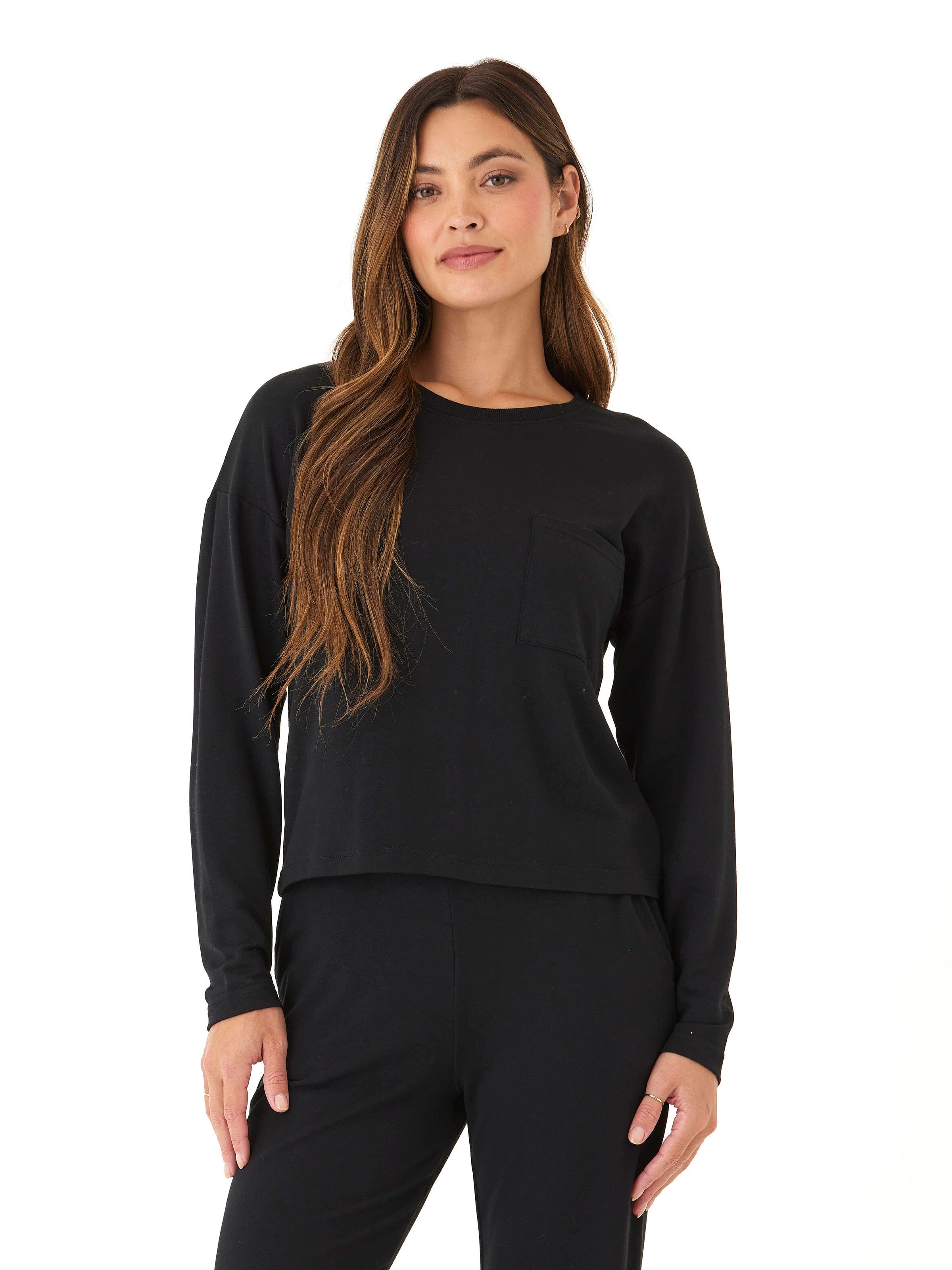 Model wearing a buttery soft Shaina Modal Terry Pocket Long Sleeve in a slightly oversized fit