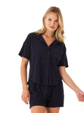 Navy short sleeve button-up shirt in geometric jacquard terry fabric with patch pocket.