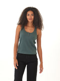 Close up of a woman wearing a dark-green fitted Kathy Organic Rib Henley Tank with button front and scoop neckline