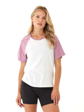 Women wearing a white and dusty-rose raglan sleeve Comfort Jersey tee