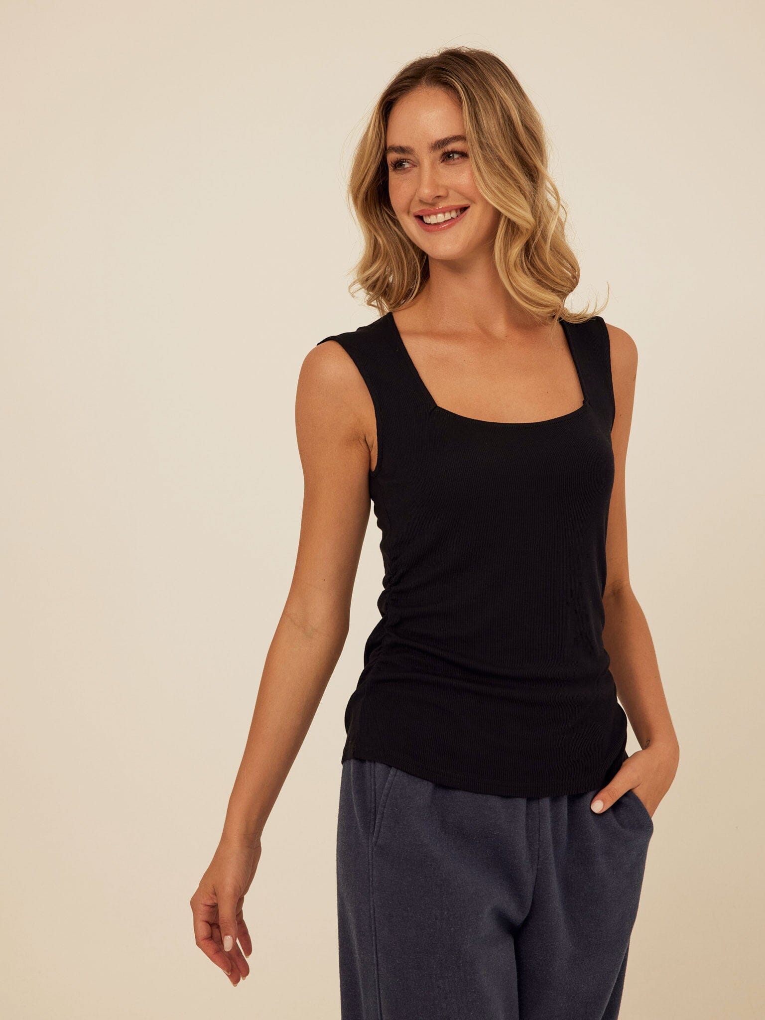 Close up of Brynlee Feather Rib Ruched Top featuring a square neckline and textured ribbed fabric.