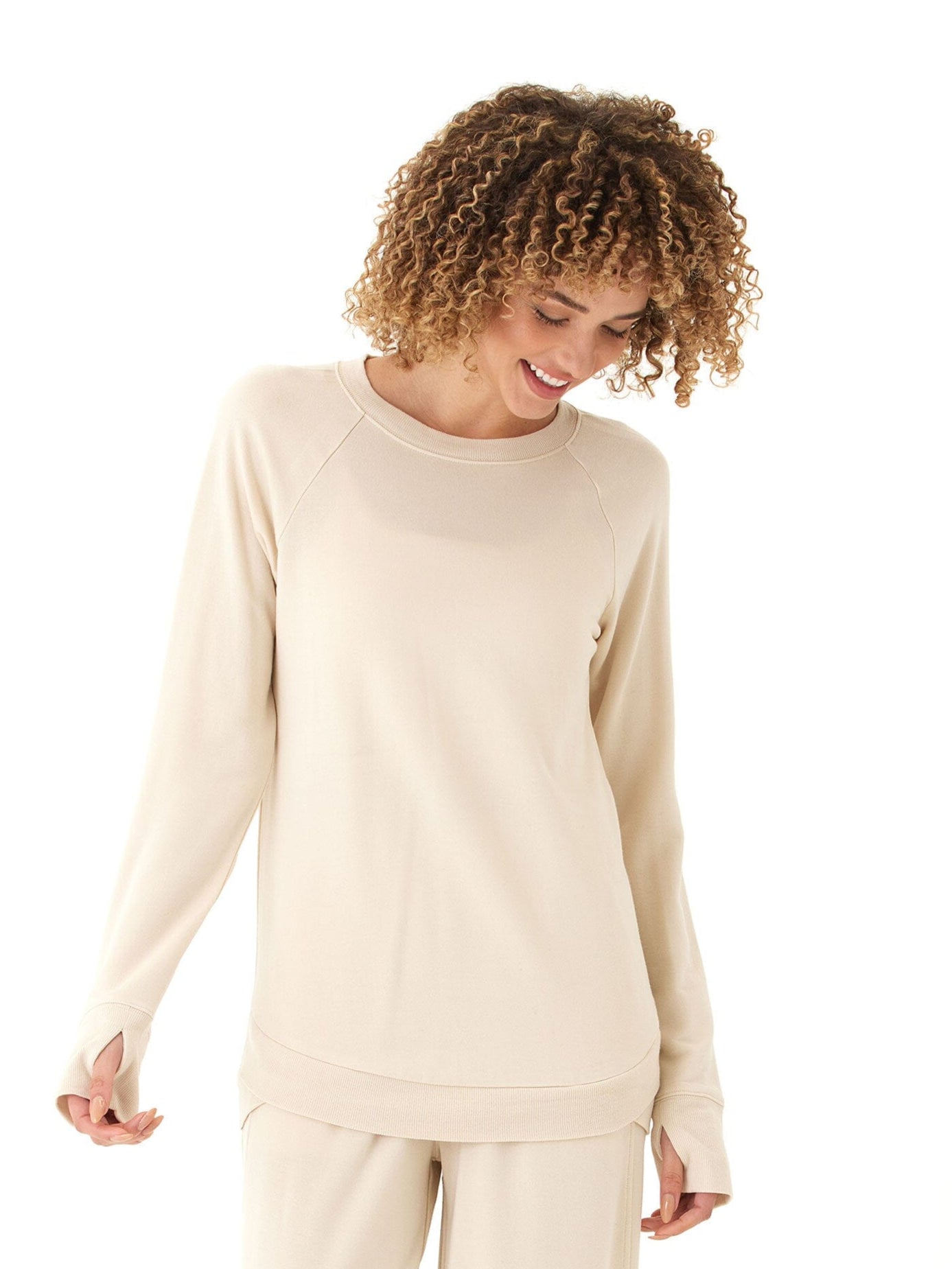 Beige Feather Fleece Tulip Hem Tunic Sweatshirt styled with a minimalist athleisure look