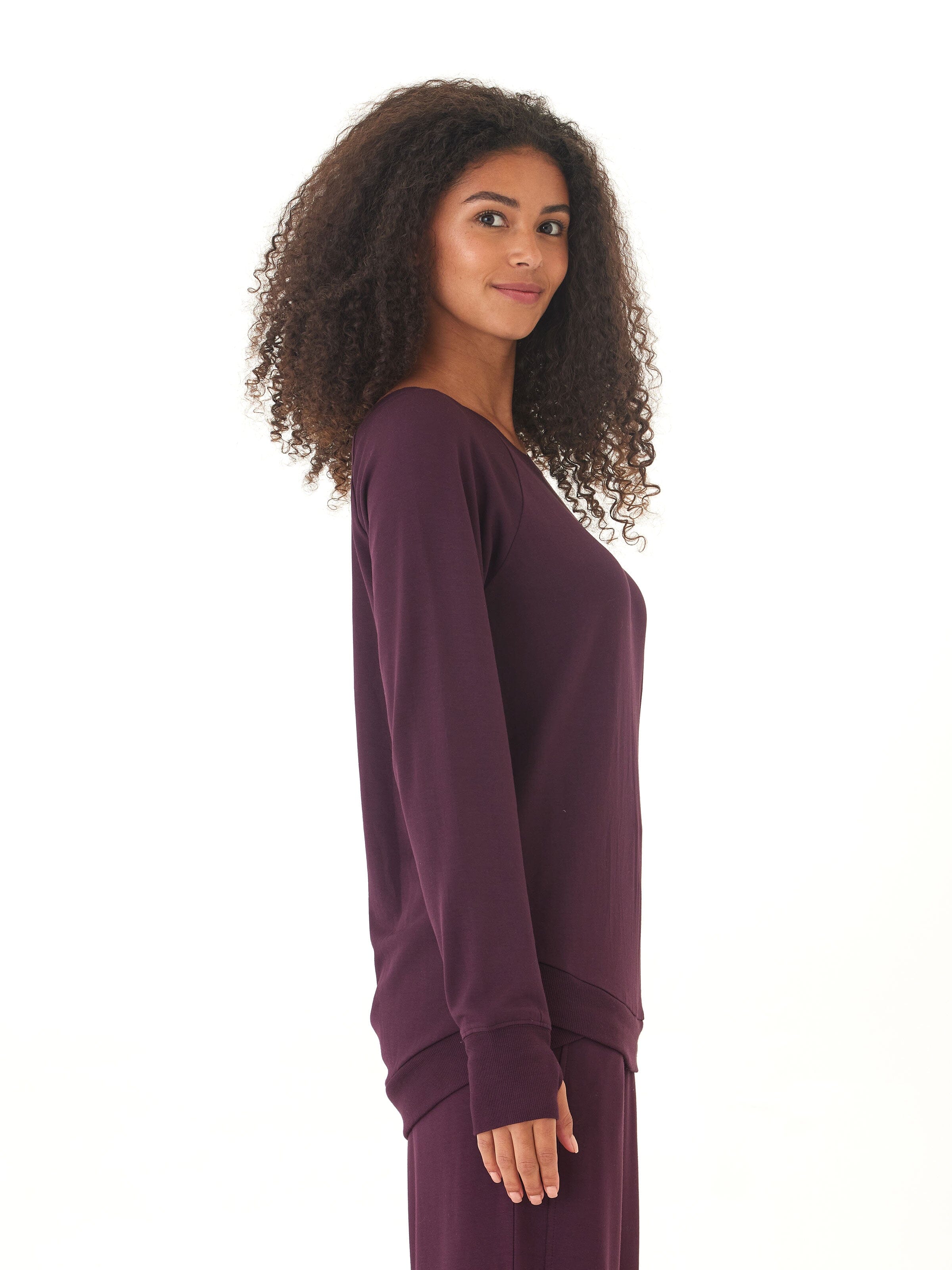 Feather Fleece Tulip Hem Tunic Sweatshirt in Dark Purple