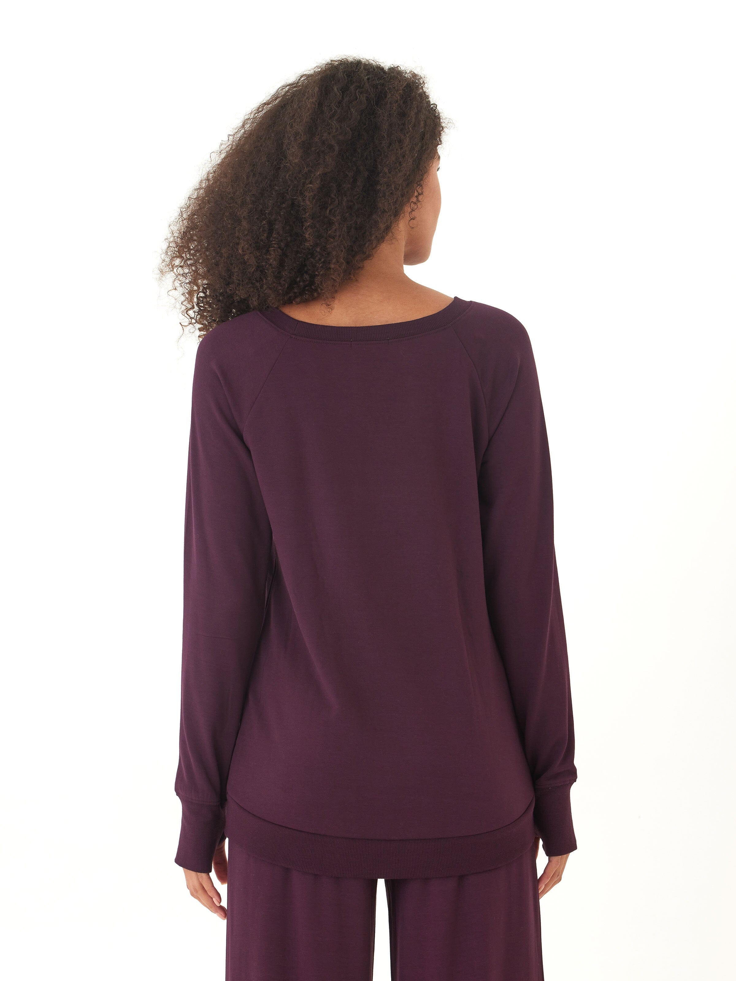 Feather Fleece Tulip Hem Tunic Sweatshirt in Dark Purple