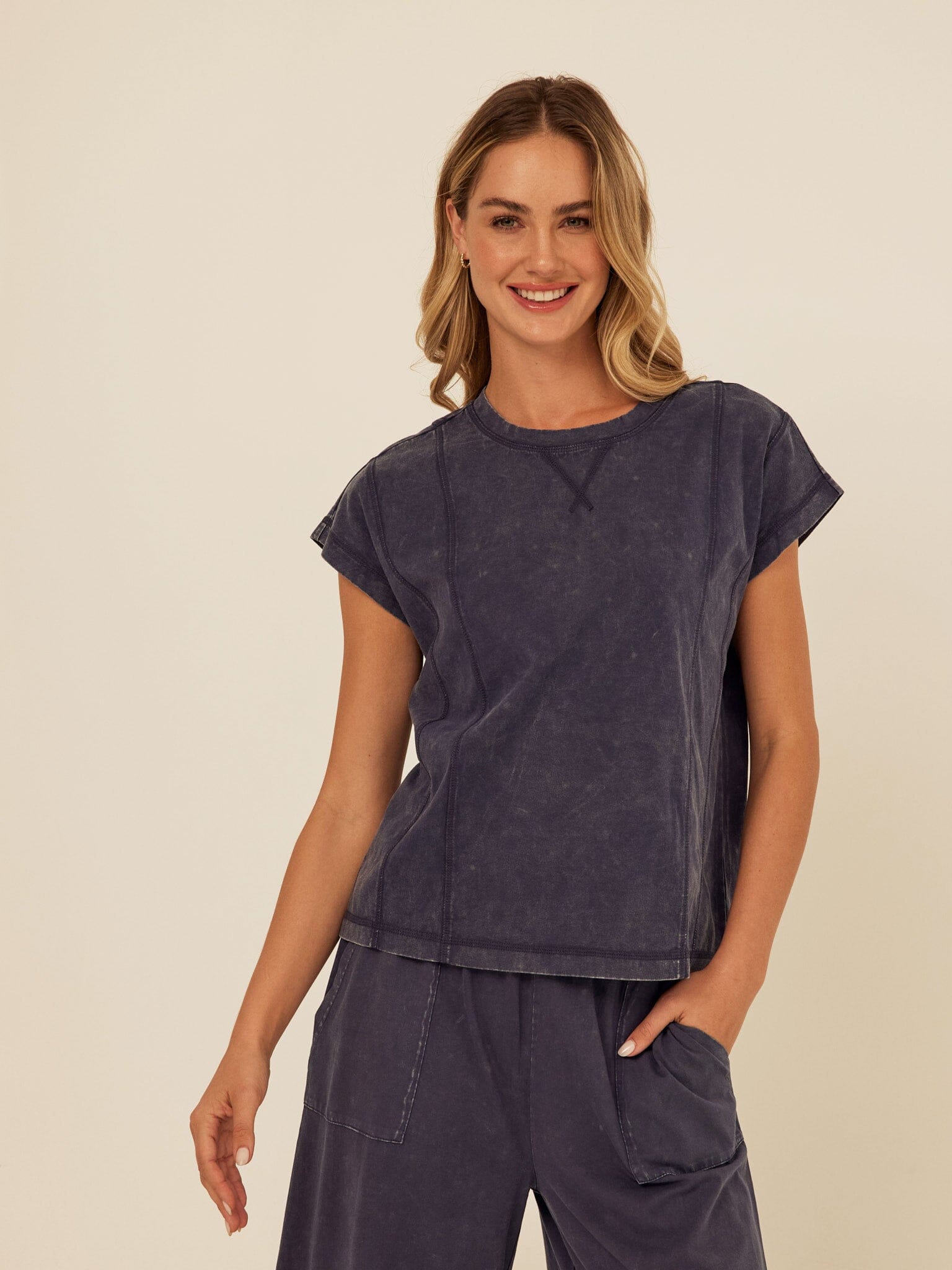 Laurie Mineral Wash Eco Jersey Tee featuring a relaxed fit, cap sleeves, and mineral wash texture.
