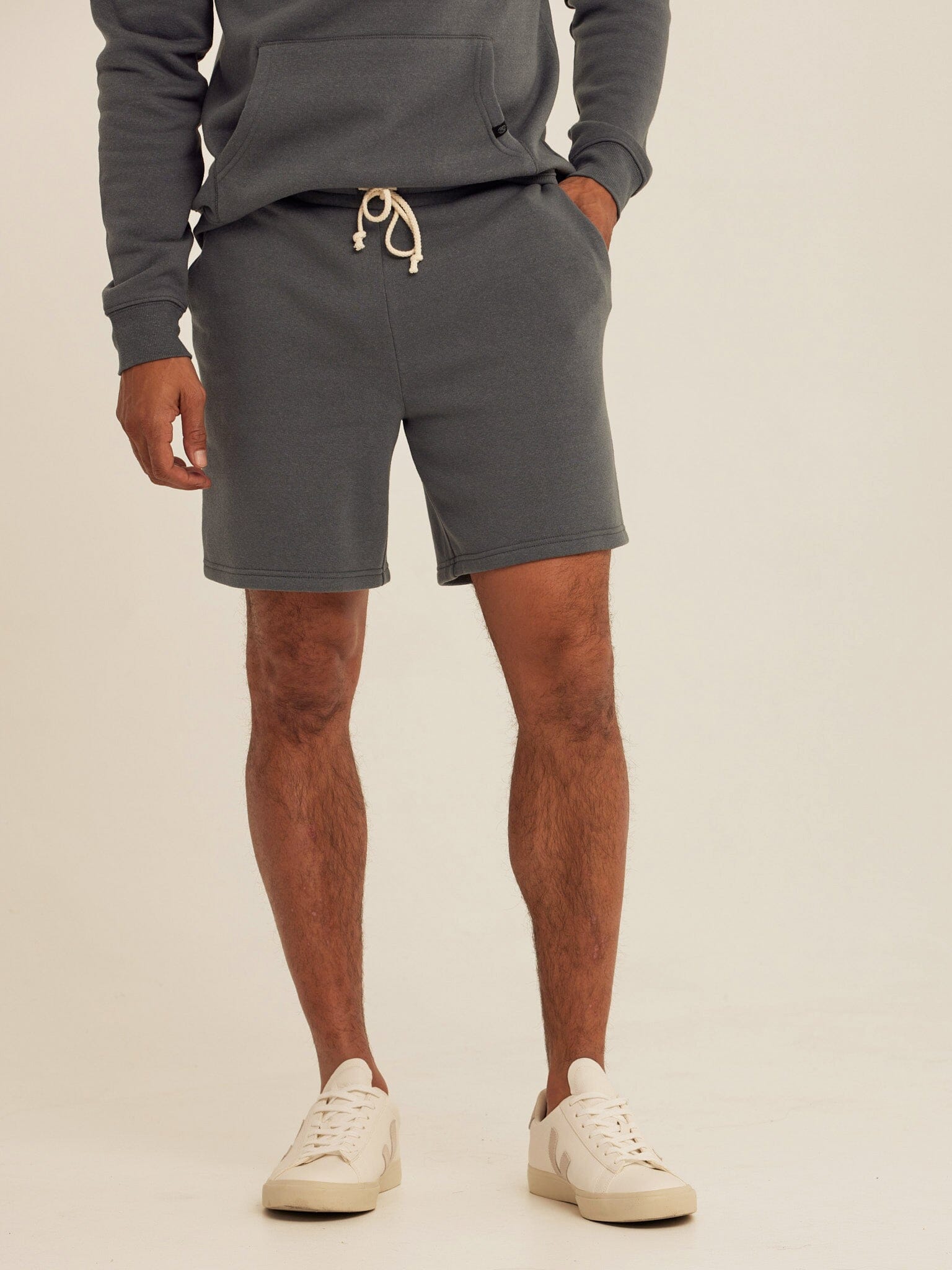 Close up of Men's Triblend Fleece Shorts in a soft, lightweight fabric with an elastic drawstring waistband.
