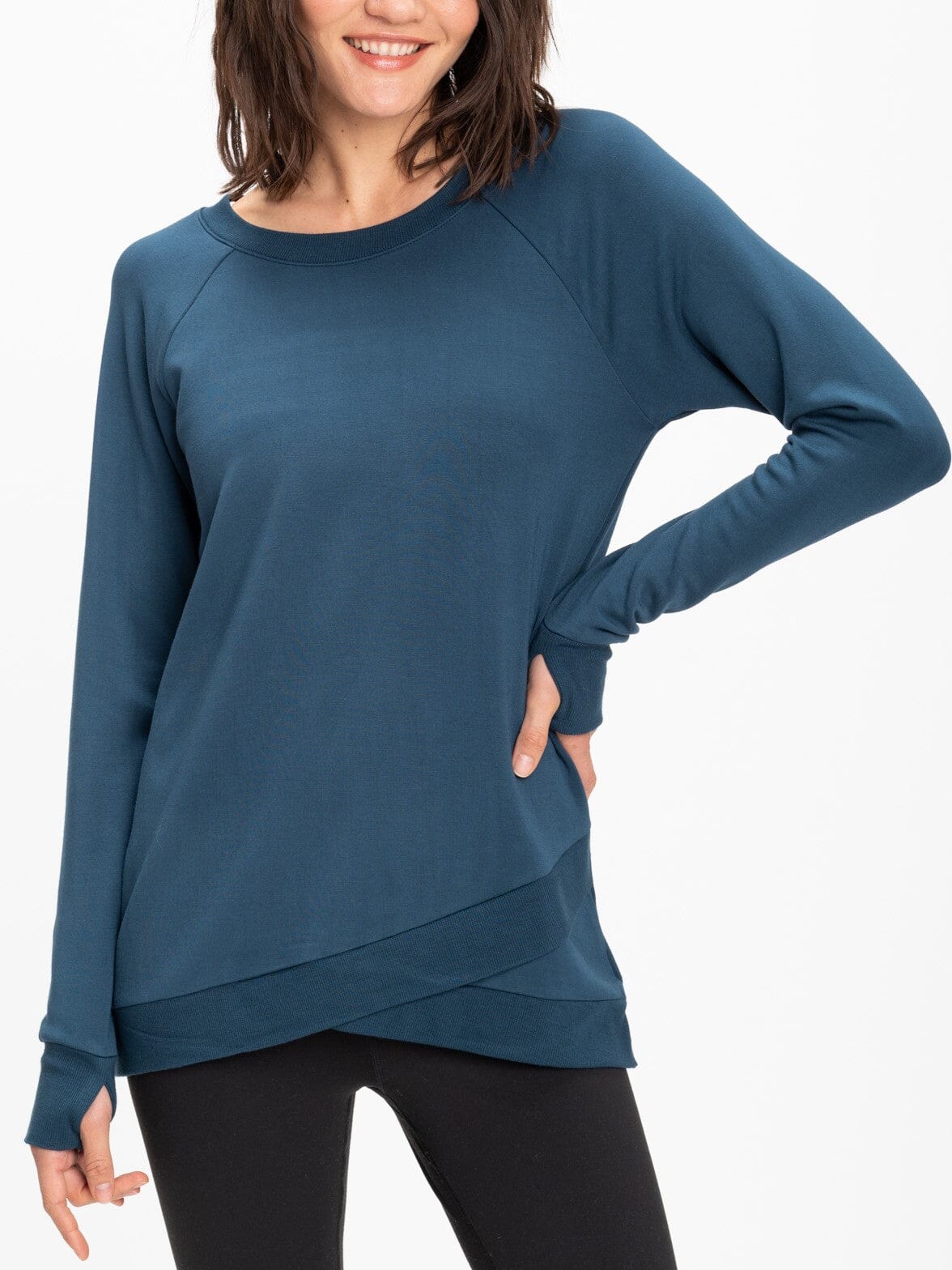 Leanna FeatherLoop Fleece tunic in teal with a stylish tulip hemline
