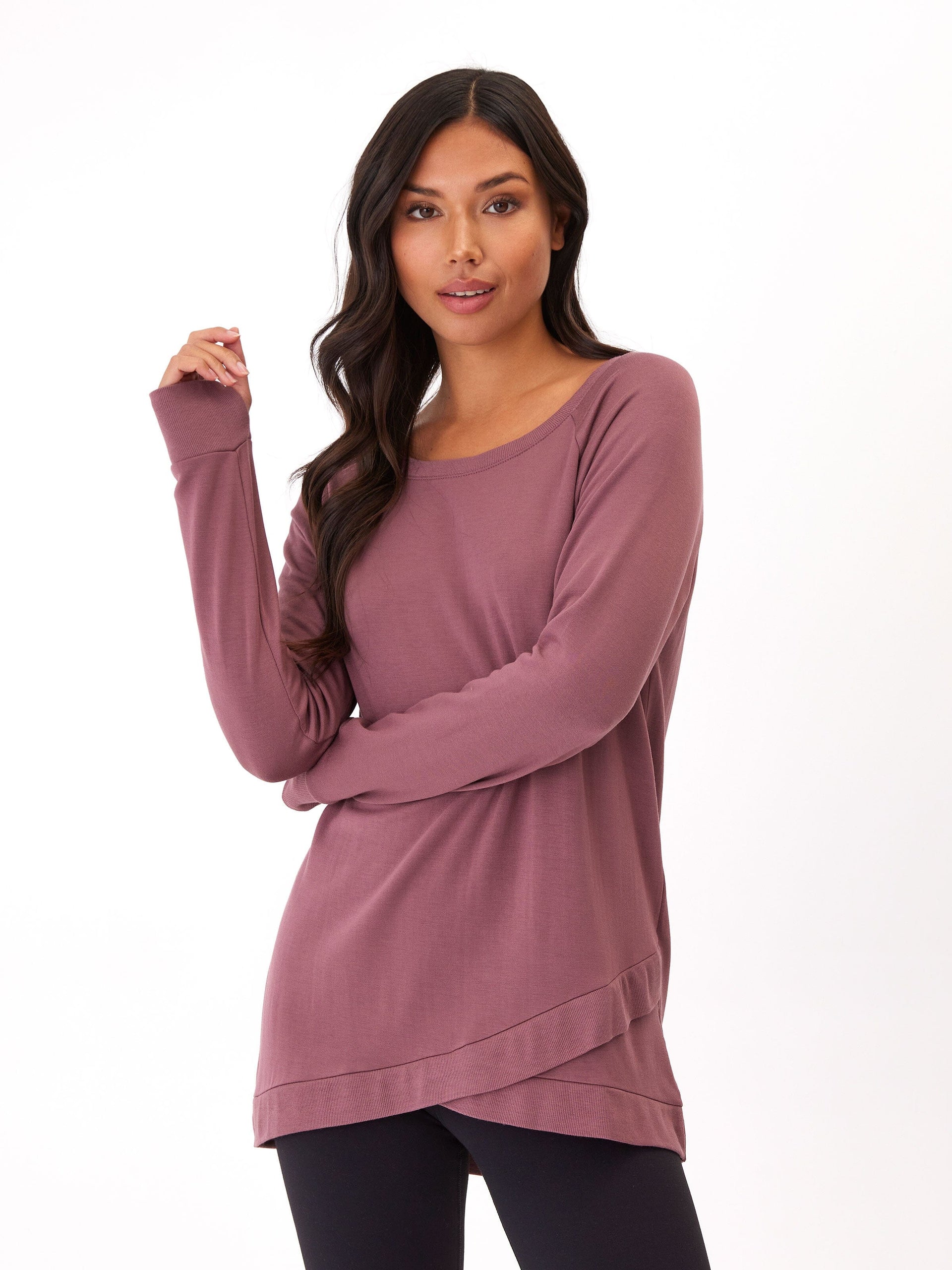Woman wearing Leanna Feather Fleece tunic sweatshirt with tulip hem