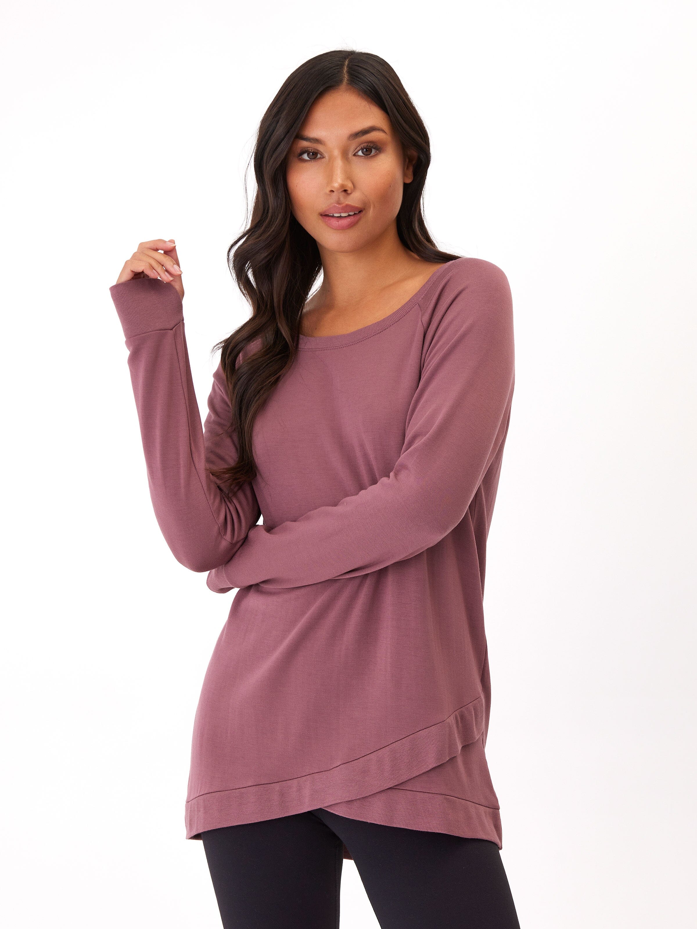 Woman wearing Leanna Feather Fleece tunic sweatshirt with tulip hem