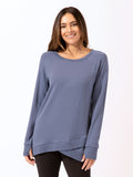 Blue Leanna feather fleece tunic featuring a stylish tulip hem and soft knit texture.