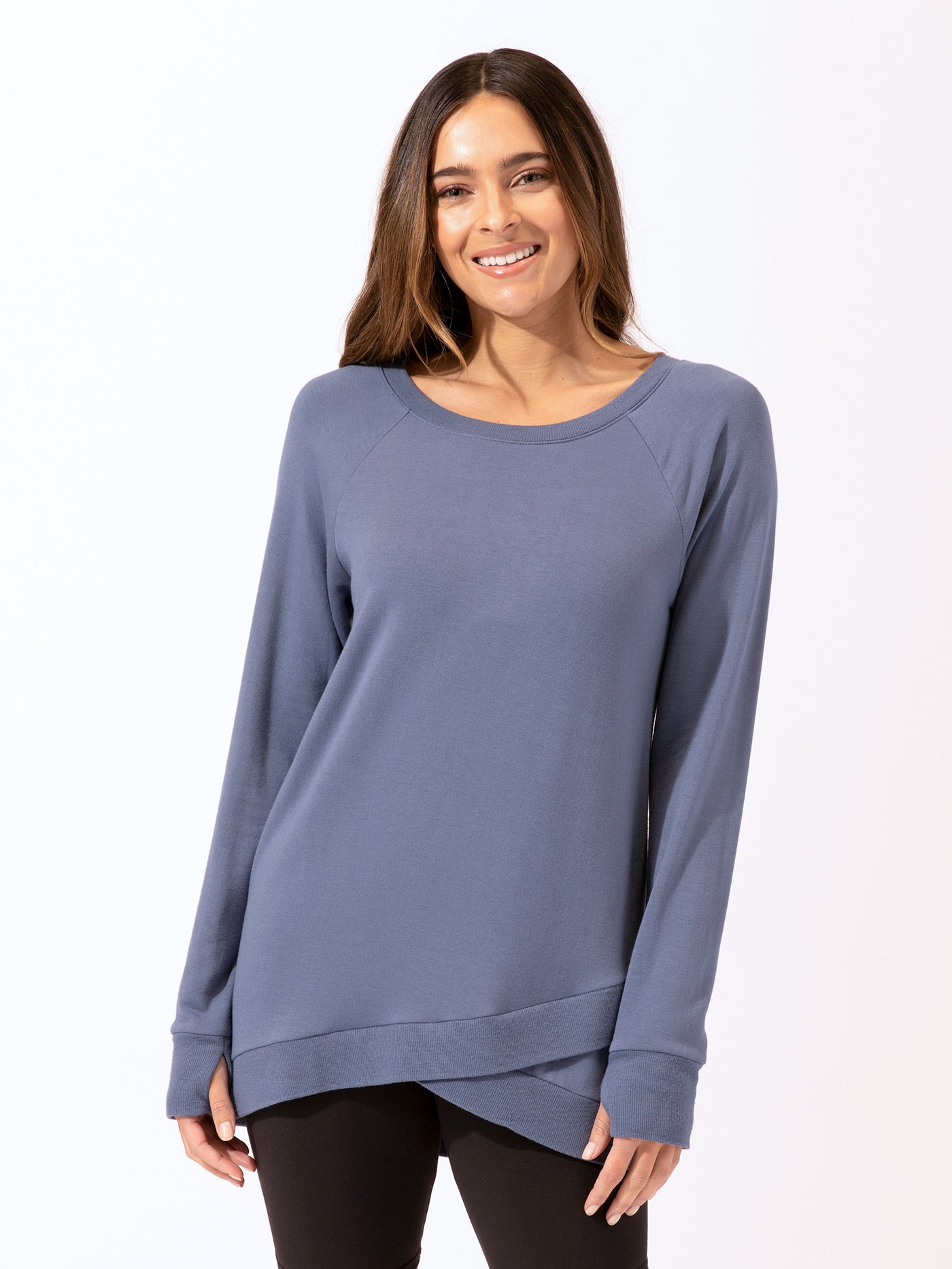 Blue Leanna feather fleece tunic featuring a stylish tulip hem and soft knit texture.