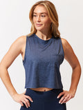 Women wearing the Rochelle Crop Tank in Navy Blue featuring a cropped fit and side pocket.