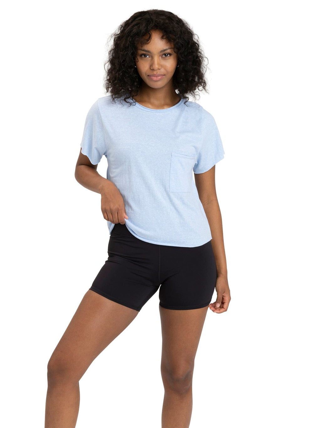 Woman wearing a high-waisted Maggie Triblend Tee in organic cotton and modal